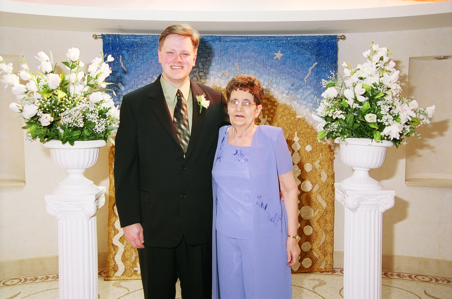 Ed and his Mom at the altar