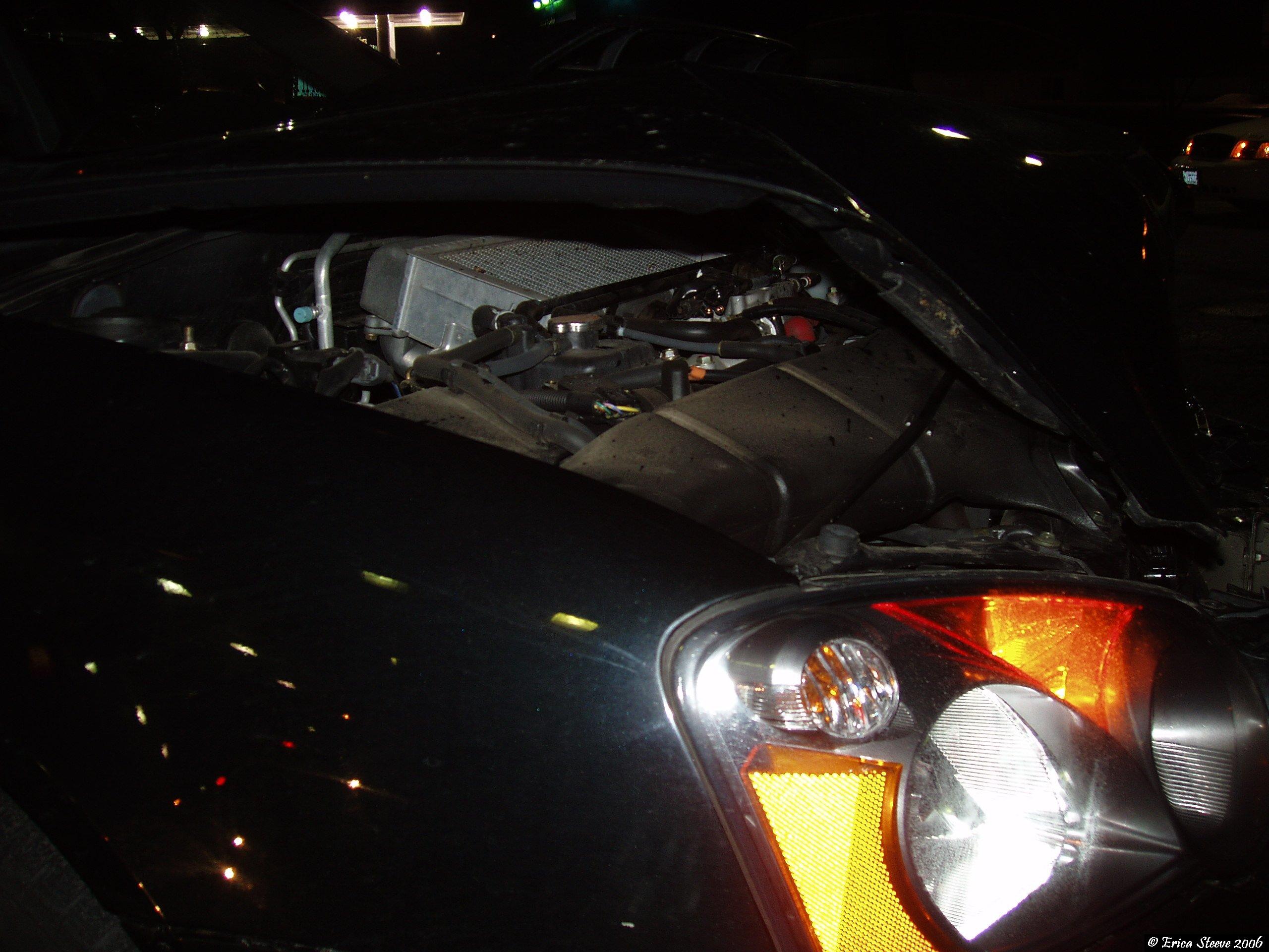Passenger headlight's fine, another glimpse under hood