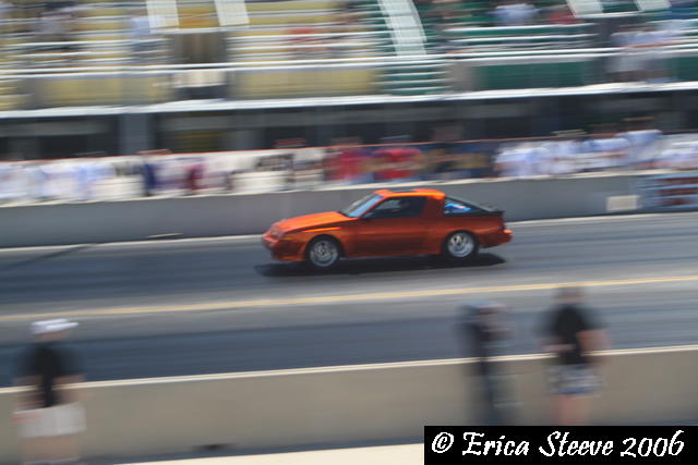 a Starion going down the track