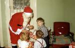 Santa visits Sharon, Steve, and Doug