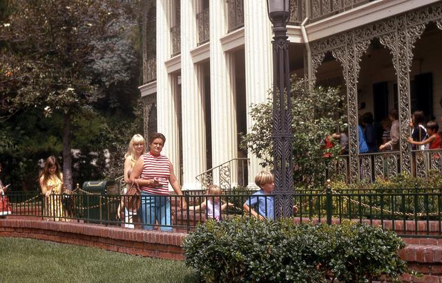 1971, 08: Barb, Mom, Carrie, & Mark getting in line at Disney