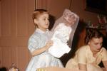 1960, 12: Sharon and new doll