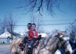 1960, 04: Doug and ? on a horse