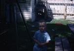 1958: boy in yard